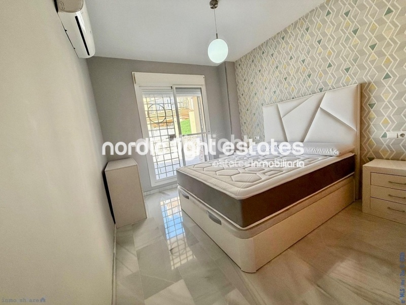 Elegante apartamento de esquina con terraza de 100m2