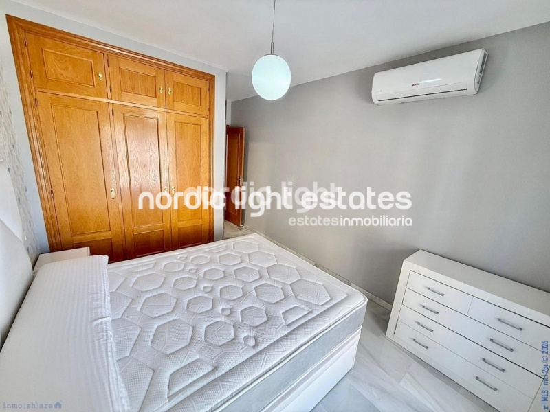 Elegante apartamento de esquina con terraza de 100m2