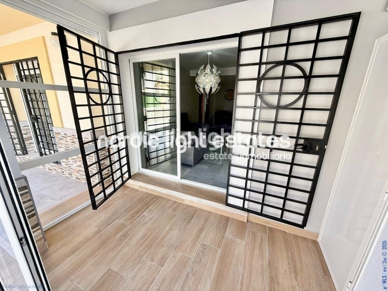 Elegante apartamento de esquina con terraza de 100m2