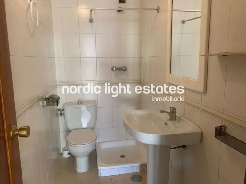 Flat in need of renovation. Poll, parking space, store room