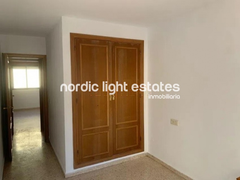 Flat in need of renovation. Poll, parking space, store room