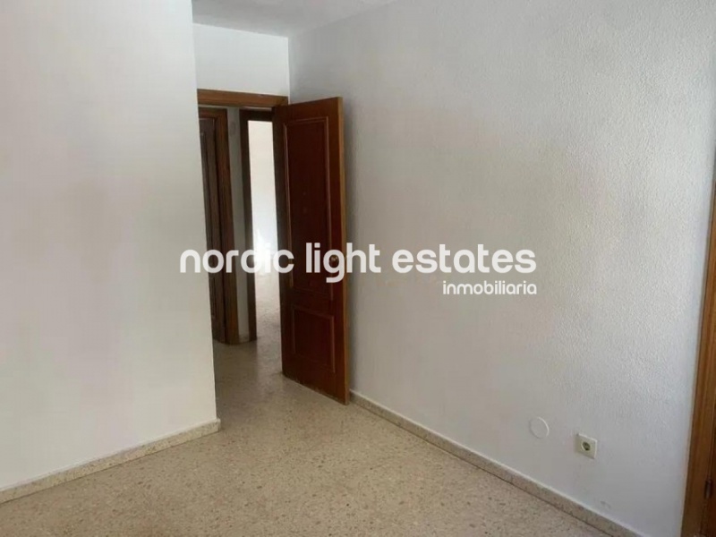 Flat in need of renovation. Poll, parking space, store room