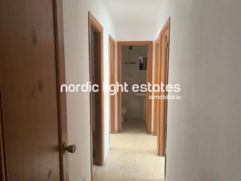 Flat in need of renovation. Poll, parking space, store room