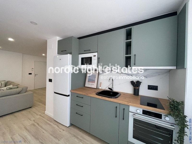 Modern renovated apartment just steps from the beach