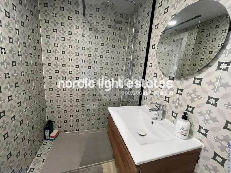 Modern renovated apartment just steps from the beach