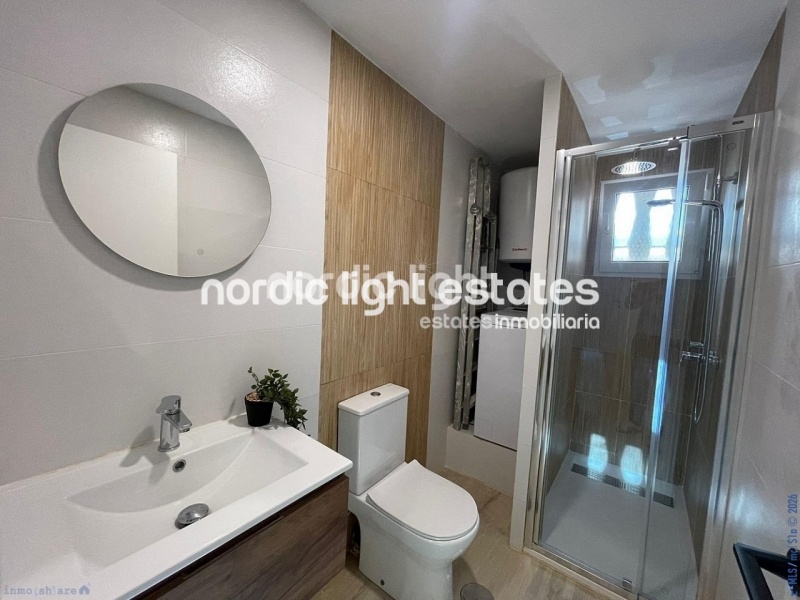 Modern renovated apartment just steps from the beach
