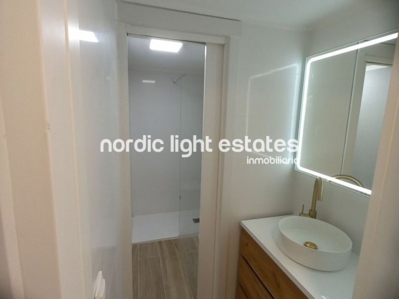 Fully renovated apartment with parking space and community pools