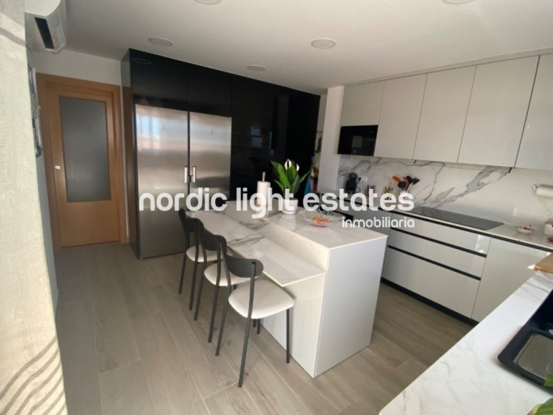 Spectacular penthouse with rooftop terrace of 169 sqm and parking space