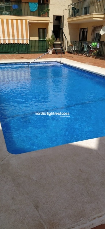 Lovely apartment with private patio and community pool