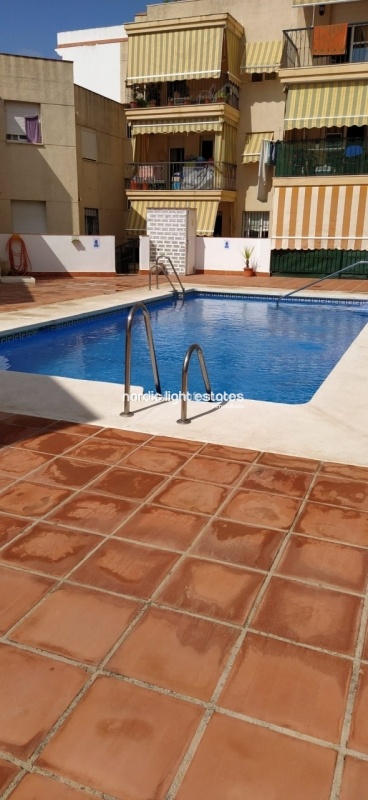Lovely apartment with private patio and community pool
