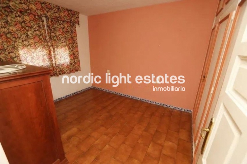 Spacious terraced house with lots of potential